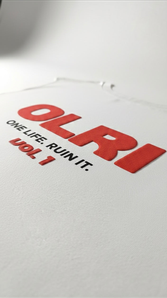 White t-shirt with red and black text on a white background